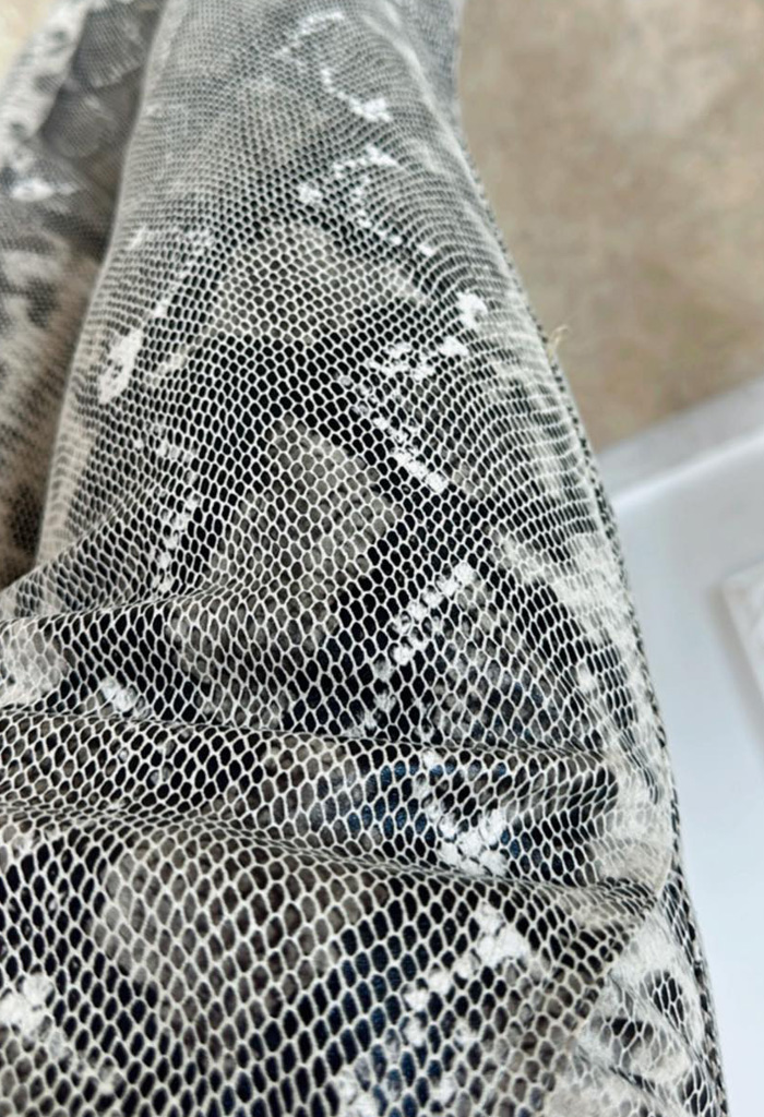 Παντελόνι καμπάνα snake print Παντελόνι καμπάνα snake print